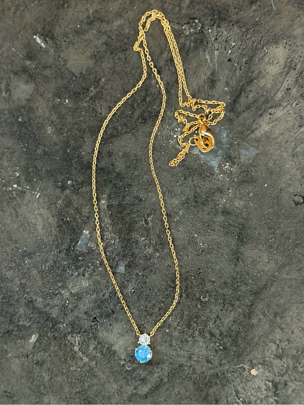 Must Have Gold-Tone Necklace with Blue and Clear Stone Pendant